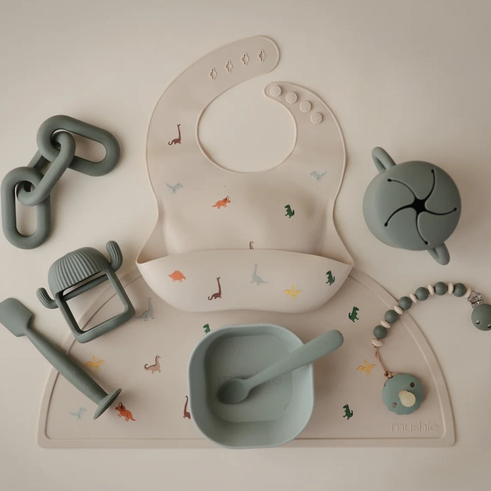 Mushie Bavoir Bébé en Silicone - Dinosaures